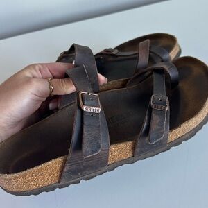 Dark brown crossover birkenstocks